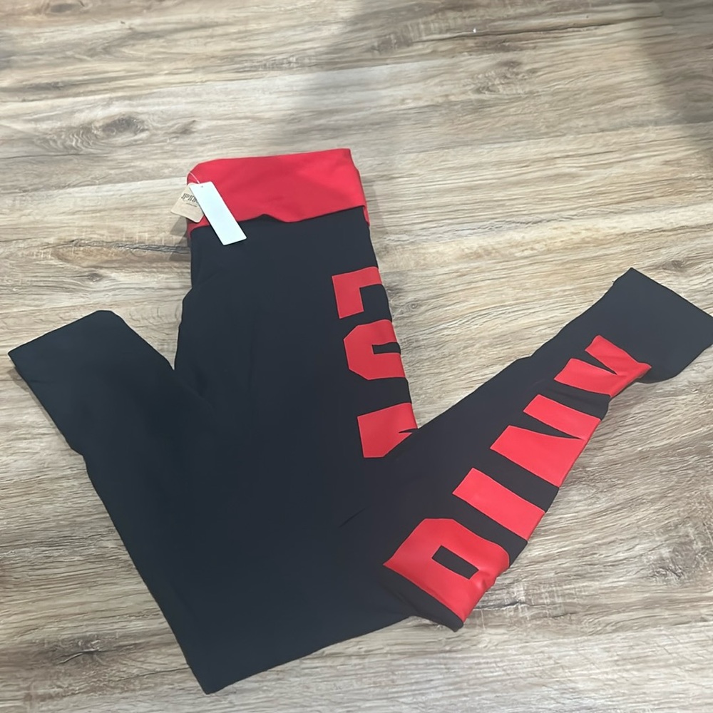 Mid Rise fold over Pink leggings.Size XS